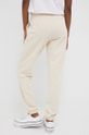 New Balance spodnie dresowe WP21508CTU pszeniczny
