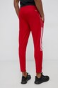 Odzież adidas Performance spodnie treningowe GJ9869 GJ9869 czerwony