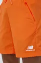orange New Balance shorts