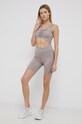 Top za trening Reebok H56396 bež SS22