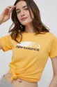 pomarańczowy New Balance t-shirt WT13800VAC