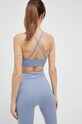 Бюстгальтер для йоги Puma Studio 521602 голубой AW23