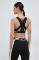 Odzież Puma biustonosz sportowy Feel It 521669 czarny