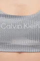 Športová podprsenka Calvin Klein Performance Essentials Základná látka: 82 % Polyester, 18 % Elastan Podšívka: 84 % Polyester, 16 % Elastan Prvky: 77 % Nylón, 23 % Elastan