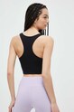 Abbigliamento New Balance reggiseno sportivo Essentials Reimagined WB31500BK nero