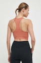 Odzież Hummel biustonosz sportowy hmlTIF SEAMLESS SPORTS TOP 210490 pomarańczowy