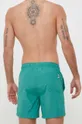 Kopalne kratke hlače United Colors of Benetton  Glavni material: 80 % Poliester, 20 % Bombaž Podloga: 100 % Poliester