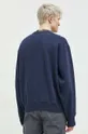 Bombažen pulover Tommy Jeans  Glavni material: 100 % Bombaž Patent: 96 % Bombaž, 4 % Elastan