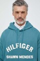 Mikina Tommy Hilfiger x Shawn Mendes tyrkysová MW0MW31185.PPYX