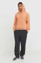 Bombažen pulover HUGO oranžna