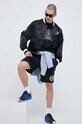 New Balance kurtka bomber MJ31580BK czarny SS23