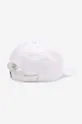 Памучна шапка с козирка Lacoste бял