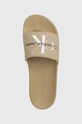 Calvin Klein Jeans klapki SLIDE MONOGRAM CO beżowy YM0YM00061