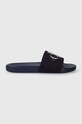 Natikači Calvin Klein Jeans SLIDE MONOGRAM CO mornarsko modra YM0YM00061