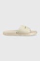 Calvin Klein Jeans klapki SLIDE MONOGRAM TPU syntetyczny beżowy YM0YM00361