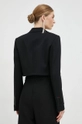 Victoria Beckham giacca Materiale principale: 100% Lana vergine Fodera 1: 100% Viscosa Fodera 2: 70% Cotone, 30% Poliammide