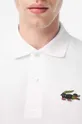 Bavlnené polo tričko Lacoste x Netflix biela