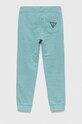 Guess spodnie dresowe bawełniane dziecięce N93Q17.KAUG0.PPYX turkusowy SS23