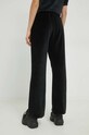 Odzież Tommy Jeans spodnie dresowe DW0DW14990.PPYX czarny