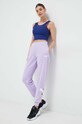 Puma spodnie dresowe 673684 fioletowy SS23