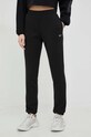 Reebok spodnie dresowe dzianina czarny HS4692