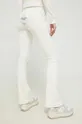 Juicy Couture spodnie dresowe Elodie 95 % Poliester, 5 % Elastan