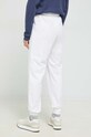 Odzież Fila spodnie dresowe FAW0559 biały