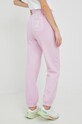 Odzież Billabong spodnie dresowe bawełniane X SMILEY ABJNP00343 różowy