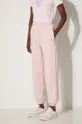 różowy New Balance spodnie dresowe bawełniane