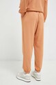 Îmbrăcăminte New Balance pantaloni de trening WP31508SEI portocaliu