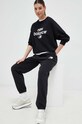 Tepláky New Balance WP31530BK čierna SS23