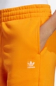 oranžová Bavlnené tepláky adidas Originals