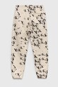 Calvin Klein Jeans spodnie dresowe dziecięce IU0IU00398.PPYX beżowy SS23