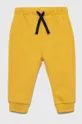 żółty United Colors of Benetton spodnie dresowe bawełniane dziecięce Dziecięcy