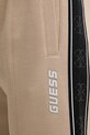 Guess spodnie dresowe MICKEY beżowy Z2YB09.KB3P2