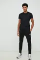 Tréninkové kalhoty adidas Essentials černá