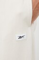Reebok Classic spodnie dresowe bawełniane beżowy HS9153