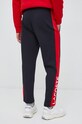 Odzież Lacoste spodnie dresowe XH8370 czerwony
