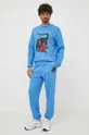 Бавовняні спортивні штани Lacoste x Netflix блакитний