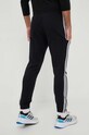 Odzież adidas spodnie dresowe bawełniane Essentials IC0050 czarny