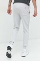 Oblečenie Bavlnené tepláky Tommy Jeans DM0DM16337.PPYX sivá