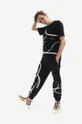 Памучен спортен панталон MCQ Taped черен