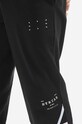 MCQ spodnie dresowe bawełniane Taped czarny 647262RST771000