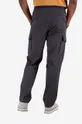 Kalhoty New Balance šedá