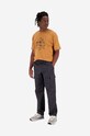 Odzież New Balance spodnie MP31526BK szary
