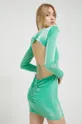 Φόρεμα Rotate  Κύριο υλικό: 65% Πολυαμίδη, 35% Πολυεστέρας Φόδρα: 95% Πολυεστέρας, 5% Σπαντέξ
