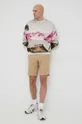 Bombažen pulover Calvin Klein pisana