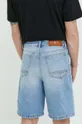 Traper kratke hlače GCDS  Temeljni materijal: 100% Pamuk Postava džepova: 65% Poliester, 35% Pamuk