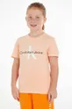 oranžová Detské bavlnené tričko Calvin Klein Jeans Chlapčenský