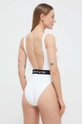 Jednodijelni kupaći kostim Calvin Klein Temeljni materijal: 80% Poliamid, 20% Elastan Postava: 92% Poliester, 8% Elastan